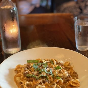 Bottega signature dishes (Restaurant) Wood-Fired Gulf Fish, Handmade Pastas, Seasonal Antipasti. (Cafe) Wood-Fired Pizzas, Salads, Panini. Bottega Favorita pizza is popular in the cafe.